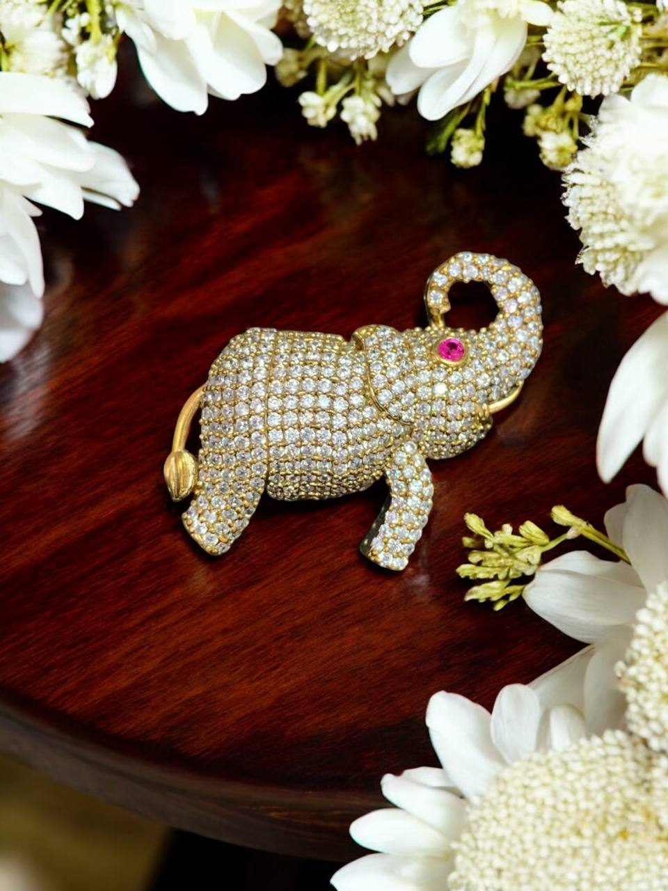Gold-Toned Crystal Elephant Brooch with Ruby Eye Accent