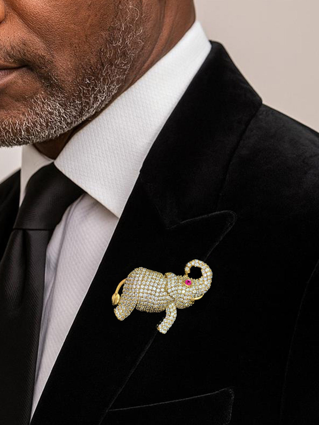 Gold-Toned Crystal Elephant Brooch with Ruby Eye Accent
