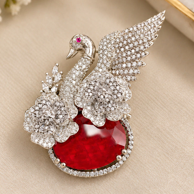 Elegant Silver-Plated Swan Brooch with Red Doublet Stone & AAA AD Stones